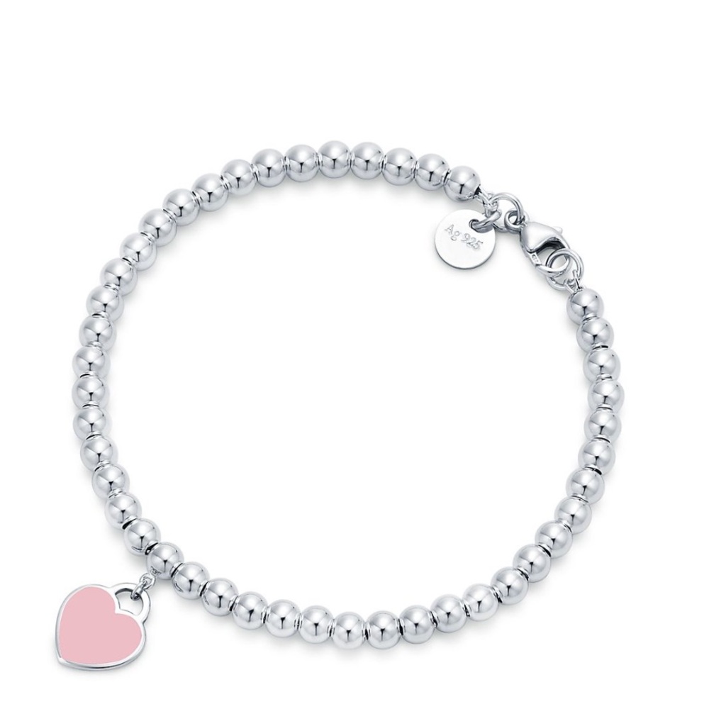 Tiffany & Co. Silver Bead Bracelet with Pink Heart Charm